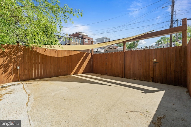 view of patio / terrace with fence