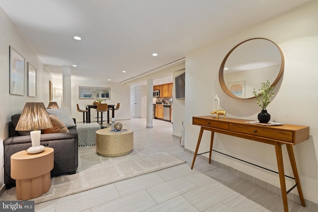 living room featuring recessed lighting