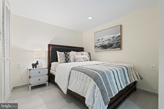 bedroom with baseboards and recessed lighting
