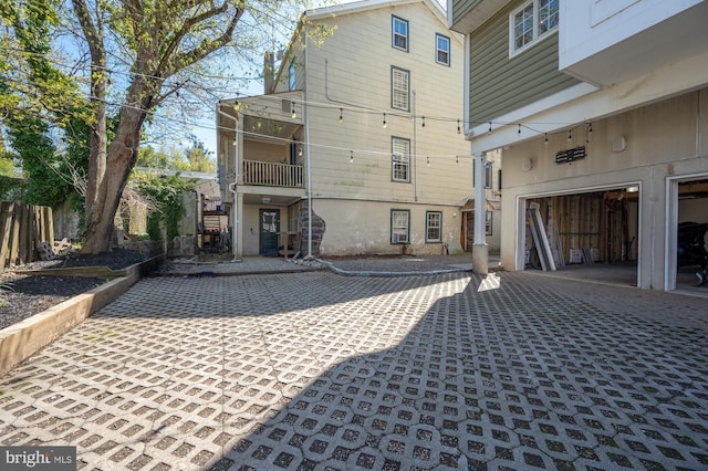 16 S Union St, Lambertville, NJ 08530 - back of property featuring driveway, fence, and a garage