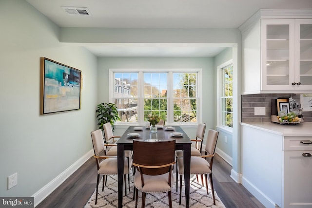 16 S Union St, Lambertville, NJ 08530 - dining space featuring dark wood-style floors, baseboards, and visible vents