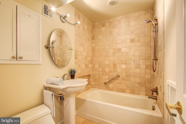 full bathroom with shower / washtub combination, tile patterned flooring, toilet, and visible vents