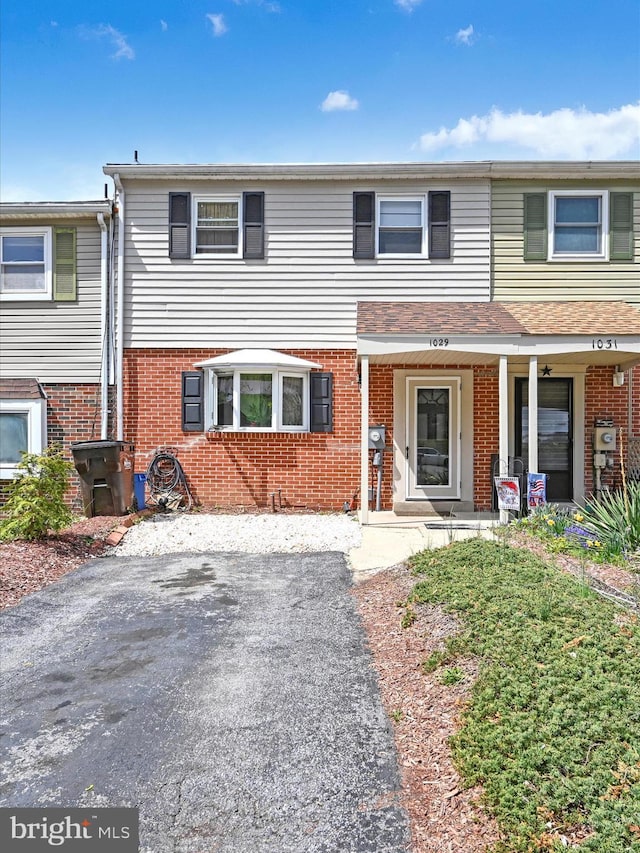 multi unit property featuring brick siding