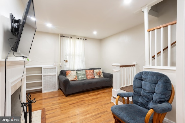 sitting room with recessed lighting and wood finished floors