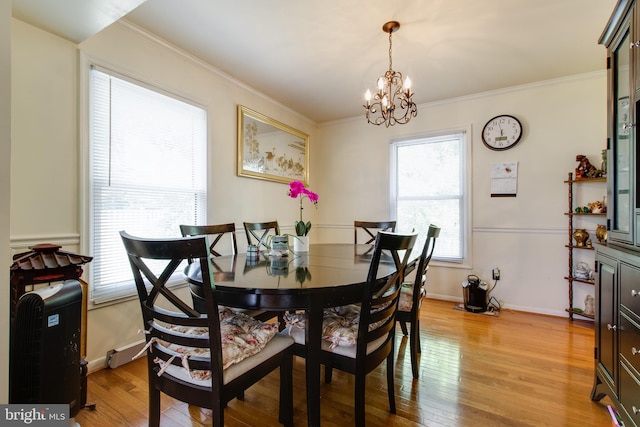 500 Kegworth Ct, Severna Park, MD 21146 - dining area featuring baseboards, a notable chandelier, light wood-type flooring, and ornamental molding