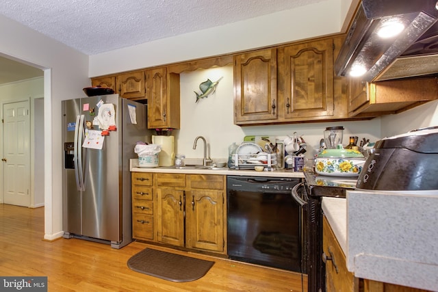 500 Kegworth Ct, Severna Park, MD 21146 - kitchen featuring stainless steel fridge, dishwasher, a sink, under cabinet range hood, and light wood finished floors