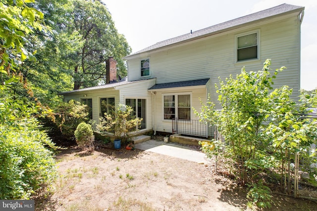 500 Kegworth Ct, Severna Park, MD 21146 - rear view of property featuring a chimney