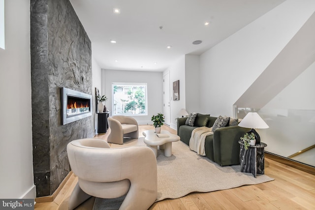 2515 Ontario Rd NW Unit 1, Washington, DC 20009 - living room with wood finished floors, a large fireplace, and recessed lighting