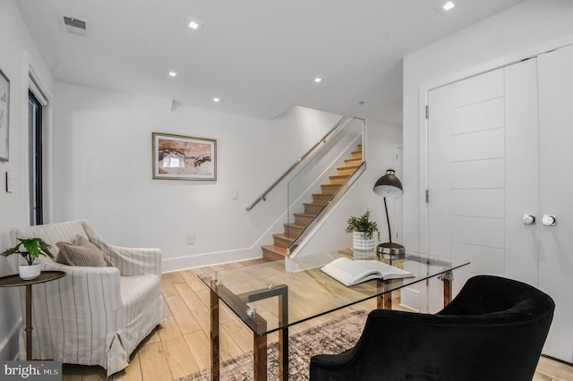 2515 Ontario Rd NW Unit 1, Washington, DC 20009 - living area featuring stairs, light wood finished floors, baseboards, and recessed lighting