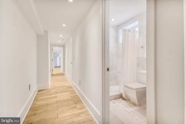 2515 Ontario Rd NW Unit 1, Washington, DC 20009 - hallway featuring light wood finished floors, baseboards, and recessed lighting
