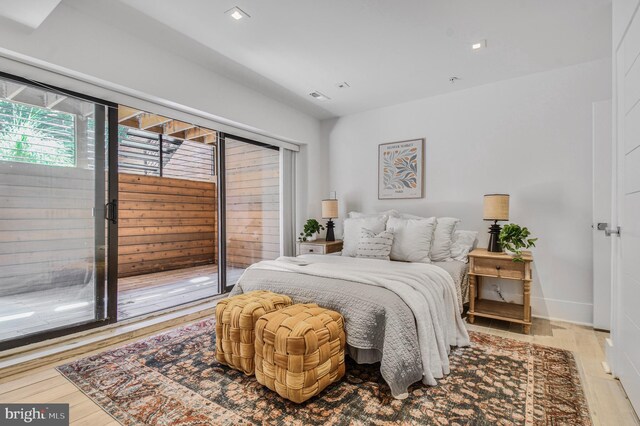 2515 Ontario Rd NW Unit 1, Washington, DC 20009 - bedroom with access to outside, light wood finished floors, and recessed lighting