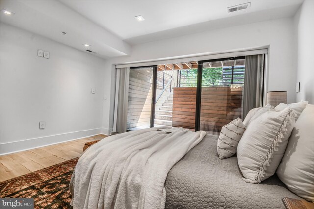 2515 Ontario Rd NW Unit 1, Washington, DC 20009 - bedroom with wood finished floors, baseboards, and recessed lighting