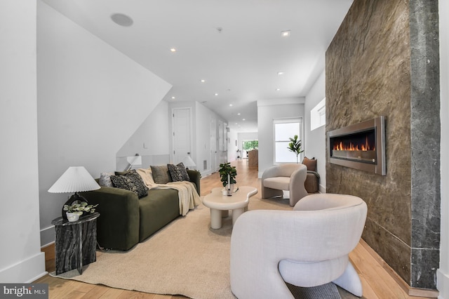2515 Ontario Rd NW Unit 1, Washington, DC 20009 - living area featuring wood finished floors, a fireplace, recessed lighting, and baseboards