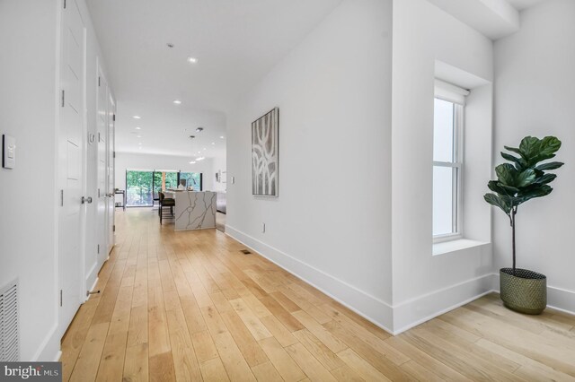 2515 Ontario Rd NW Unit 1, Washington, DC 20009 - corridor featuring light wood-type flooring, baseboards, and recessed lighting