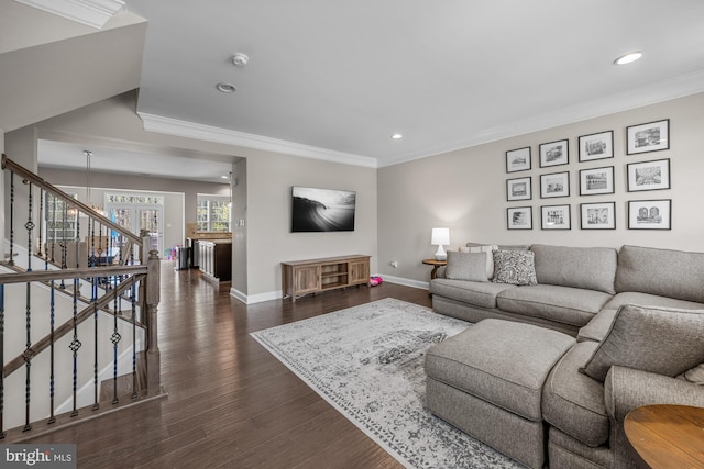 living room featuring crown molding, baseboards, recessed lighting, and dark wood finished floors