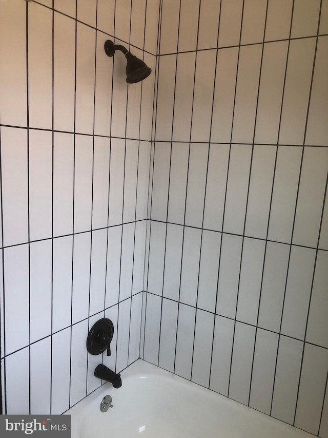 bathroom with  shower combination and radiator