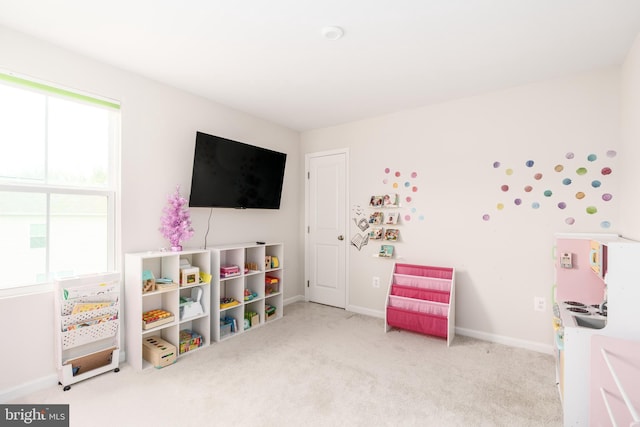 game room featuring carpet floors and baseboards