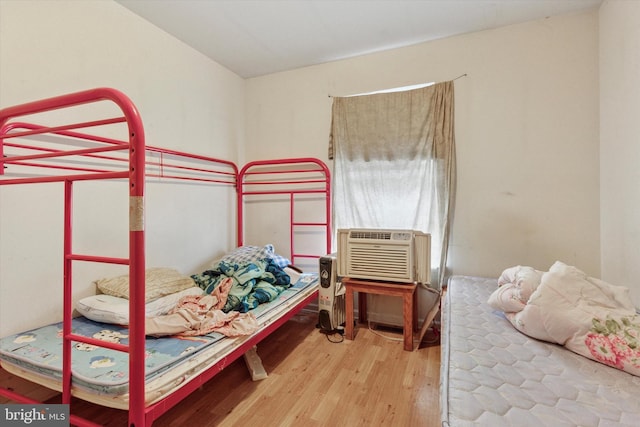 bedroom with wood finished floors