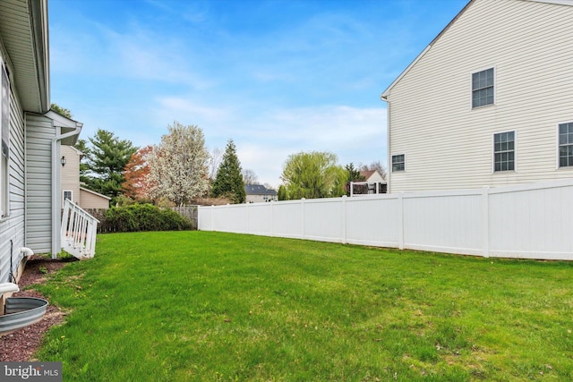 view of yard with fence