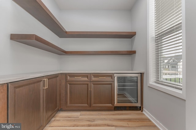 350 Star Tavern Ln, West Chester, PA 19382 - bar with light wood finished floors, a dry bar, and beverage cooler