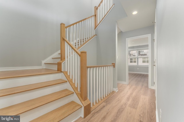 350 Star Tavern Ln, West Chester, PA 19382 - stairway featuring baseboards, wood finished floors, and recessed lighting