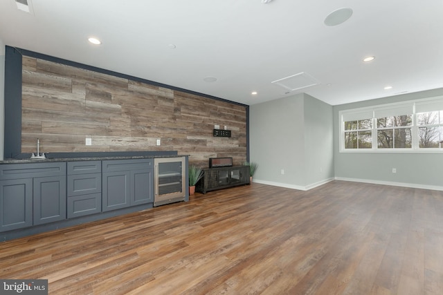 350 Star Tavern Ln, West Chester, PA 19382 - bar featuring wooden walls, wet bar, wine cooler, and baseboards