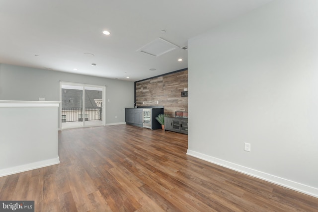 350 Star Tavern Ln, West Chester, PA 19382 - unfurnished living room featuring attic access, wood finished floors, baseboards, and recessed lighting