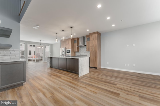 350 Star Tavern Ln, West Chester, PA 19382 - kitchen featuring wall chimney exhaust hood, baseboards, recessed lighting, decorative backsplash, and appliances with stainless steel finishes