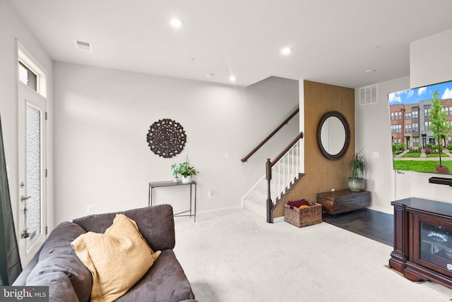 22186 Mccormick Ter, Ashburn, VA 20148 - carpeted living room featuring stairs, baseboards, and recessed lighting
