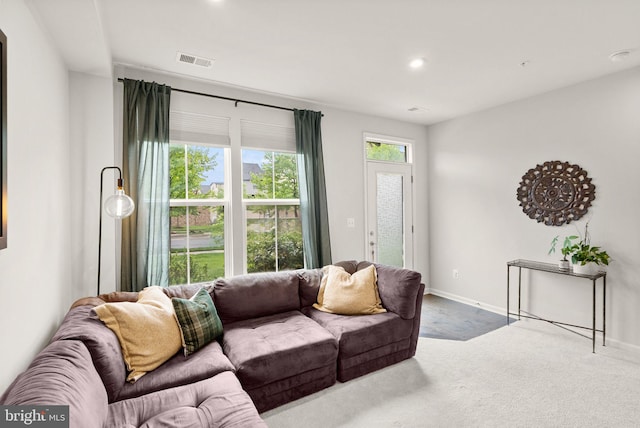 22186 Mccormick Ter, Ashburn, VA 20148 - carpeted living room featuring recessed lighting and baseboards