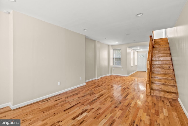 2512 N Marshall St, Philadelphia, PA 19133 - unfurnished living room featuring light wood-style flooring, recessed lighting, baseboards, and stairway