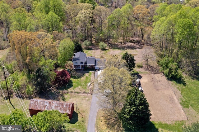 5650 Warren Dr, Huntingtown, MD 20639 - drone / aerial view with a wooded view