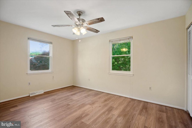 5650 Warren Dr, Huntingtown, MD 20639 - spare room featuring baseboards, visible vents, ceiling fan, and light wood finished floors