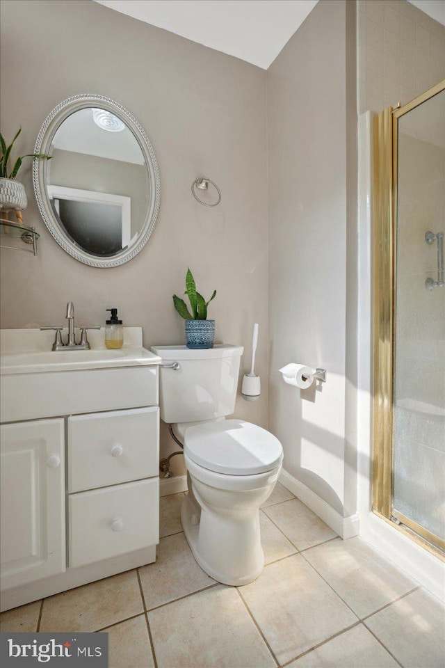 5650 Warren Dr, Huntingtown, MD 20639 - full bathroom with tile patterned flooring, vanity, toilet, baseboards, and a stall shower