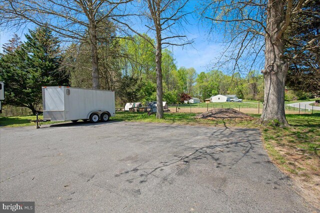 5650 Warren Dr, Huntingtown, MD 20639 - view of car parking with fence
