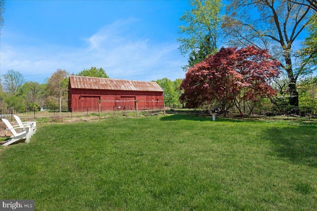 5650 Warren Dr, Huntingtown, MD 20639 - view of yard featuring fence, an outbuilding, and an outdoor structure