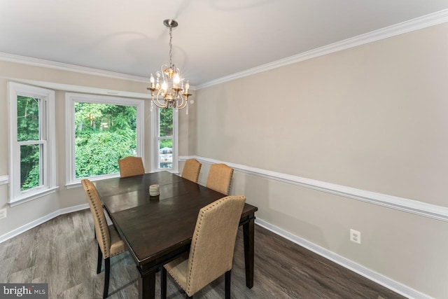 2320 Harpoon Dr, Stafford, VA 22554 - dining area with a chandelier, wood finished floors, and crown molding