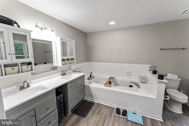 2320 Harpoon Dr, Stafford, VA 22554 - full bath with a bath, wood finished floors, and double vanity