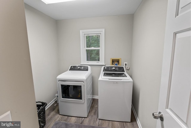 2320 Harpoon Dr, Stafford, VA 22554 - laundry area with separate washer and dryer and wood finished floors