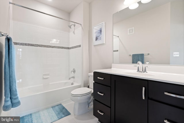 full bathroom featuring visible vents, toilet, bathtub / shower combination, vanity, and tile patterned flooring