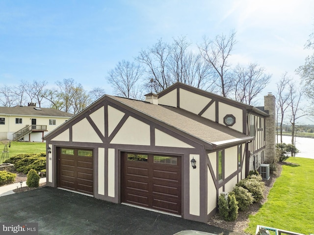 garage featuring a water view