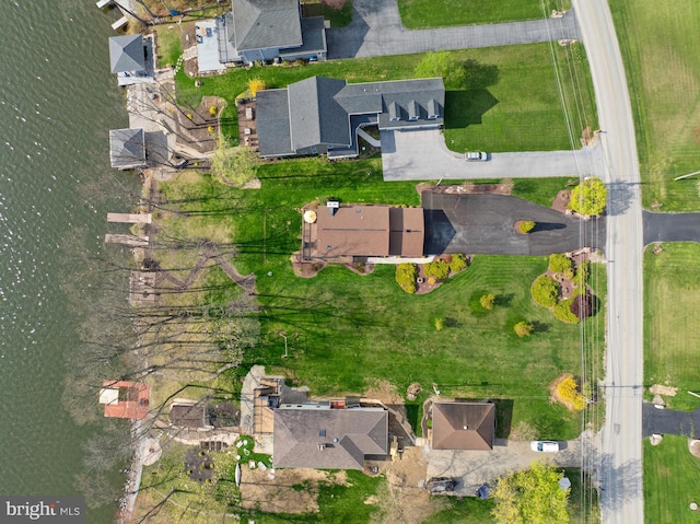 birds eye view of property featuring a water view