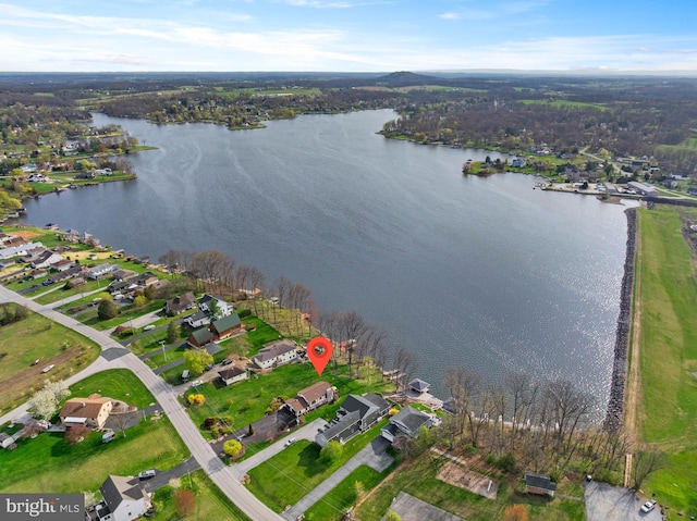 bird's eye view featuring a water view and a residential view