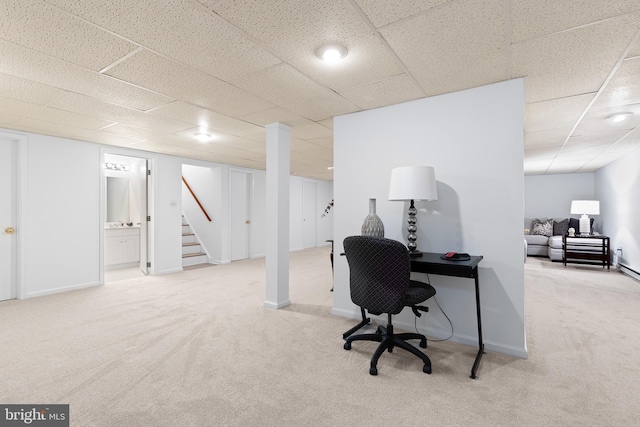 home office featuring baseboards, carpet floors, and a drop ceiling