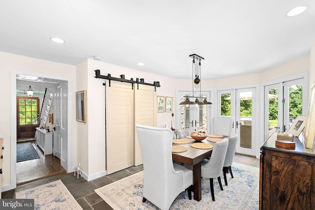 36437 Whispering Springs Ct, Purcellville, VA 20132 - dining room with a barn door, recessed lighting, french doors, and baseboards