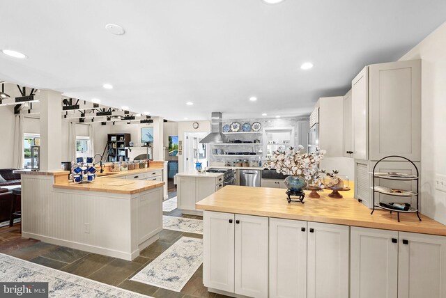 36437 Whispering Springs Ct, Purcellville, VA 20132 - kitchen featuring wood counters, stainless steel appliances, open floor plan, a center island with sink, and recessed lighting