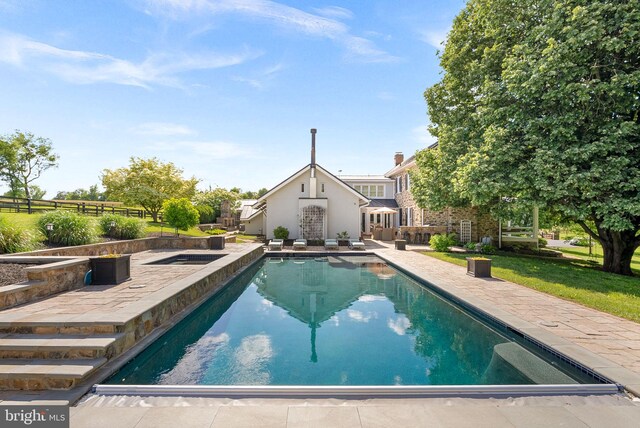 36437 Whispering Springs Ct, Purcellville, VA 20132 - swimming pool with a patio area