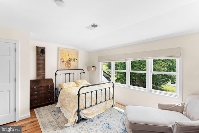 36437 Whispering Springs Ct, Purcellville, VA 20132 - bedroom featuring lofted ceiling, light wood finished floors, and baseboards