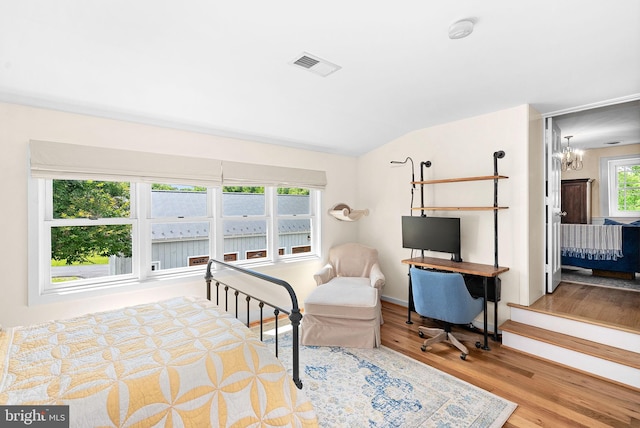 36437 Whispering Springs Ct, Purcellville, VA 20132 - bedroom featuring wood finished floors, lofted ceiling, a chandelier, and baseboards