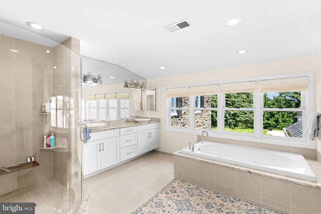 36437 Whispering Springs Ct, Purcellville, VA 20132 - bathroom with double vanity, a garden tub, a tile shower, tile patterned floors, and recessed lighting
